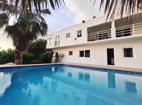 Whispering Clouds Beach House